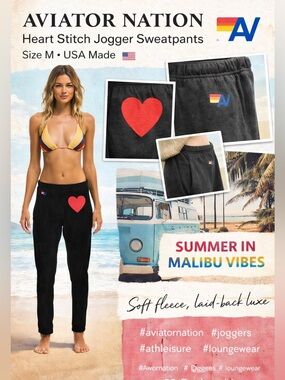 Aviator Nation Black Sweatpants with Yellow Label and Red Heart Accent